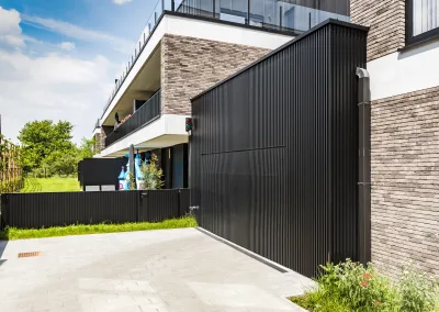 Linarte wall cladding with garage door